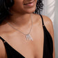 Give your special someone a custom vertical necklace made just for them! Our Personalized Vertical Name Necklace is the perfect gift for your loved ones and will become a versatile accessory for any occasion. From a heart-warming holiday present, anniversary or birthday gift, or just because, this unique necklace adds a trendy touch to any outfit.